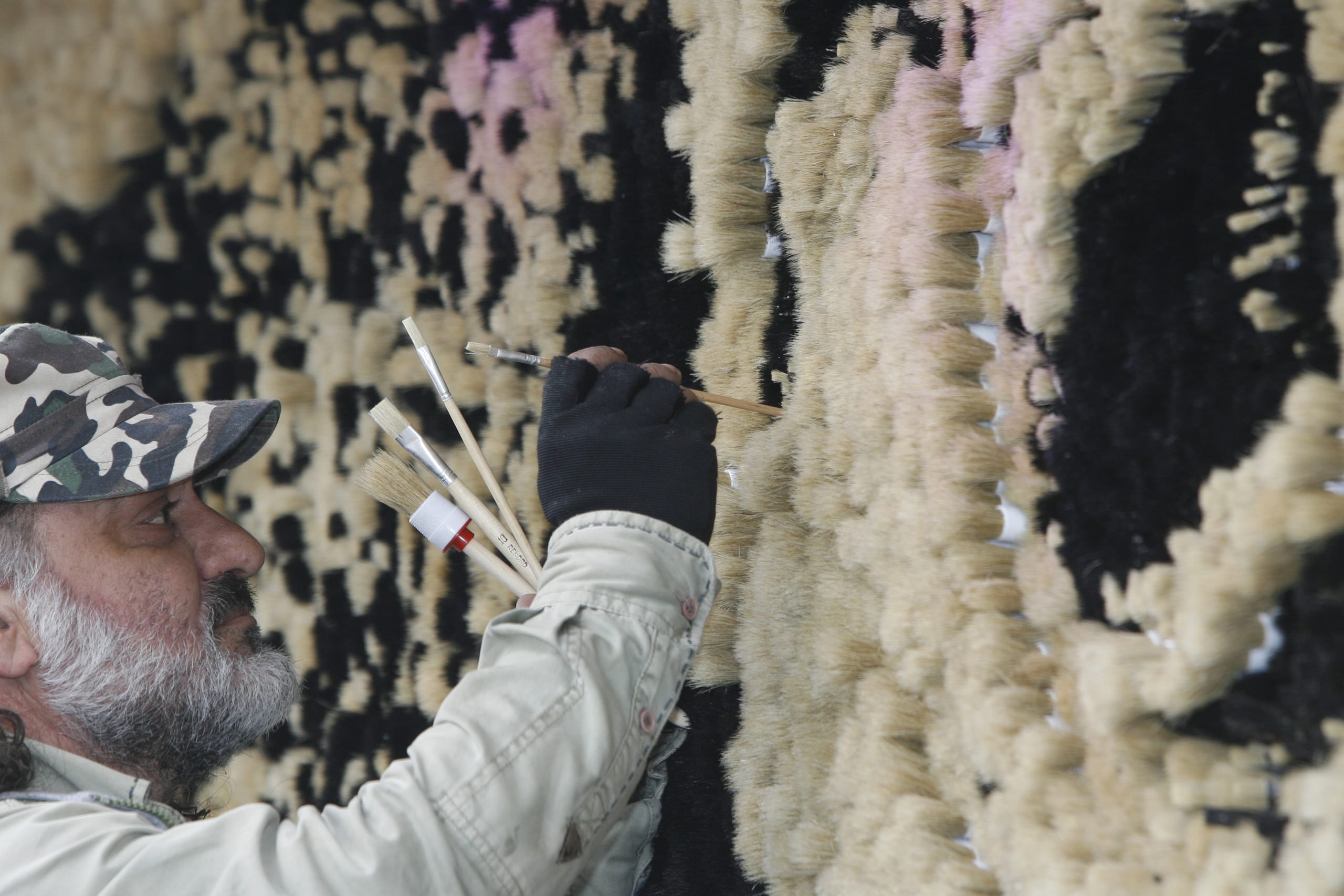 Saimir with the paintbrush mosaic